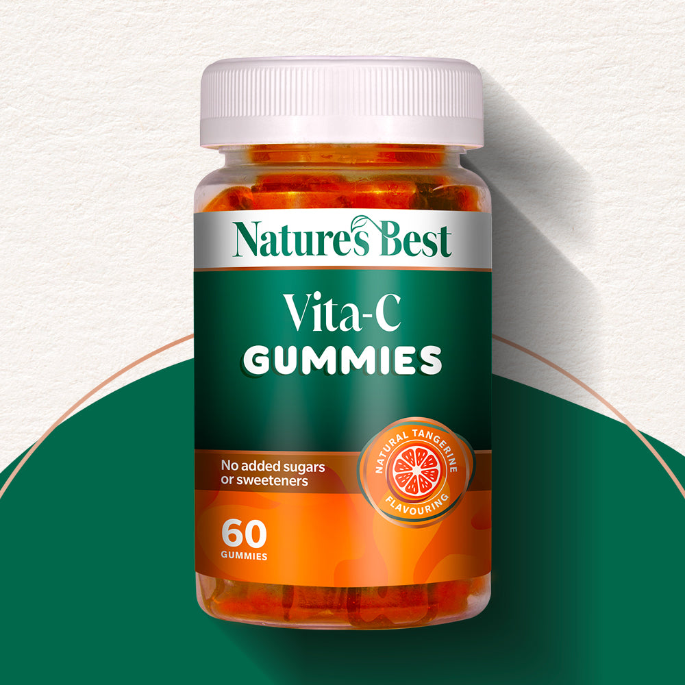 Bottle of Nature's Best Vita-C Gummies on a green and white background