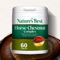 Nature's Best Horse Chestnut Complex supplement container with horse legs in the background