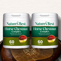 Two bottles of Nature's Best Horse Chestnut Complex on a wooden surface with a white background.
