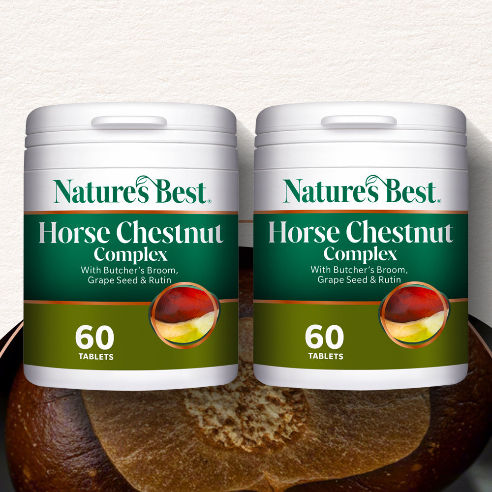 Two bottles of Nature's Best Horse Chestnut Complex on a wooden surface with a white background.