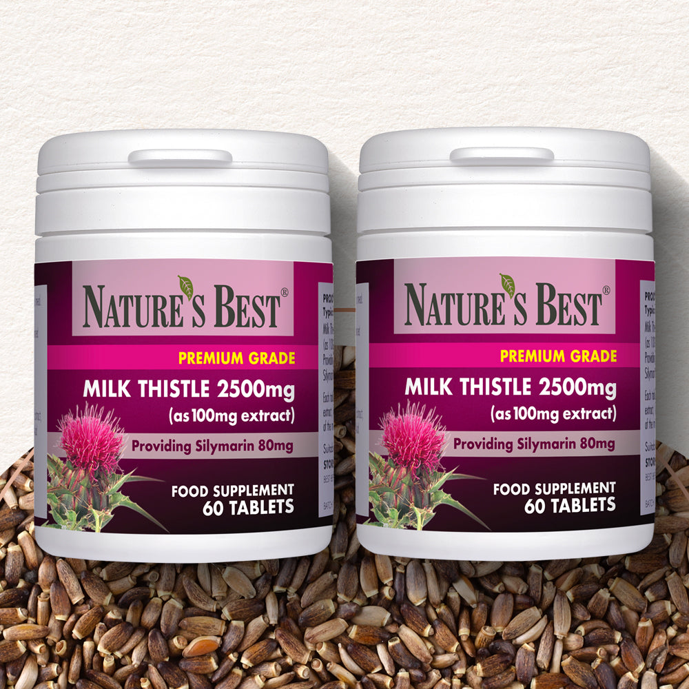 Two bottles of Nature's Best Milk Thistle supplement on a background with seeds.