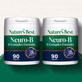 Two containers of Nature's Best Neuro-B B Complex Formula on a green and white background