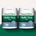 Two containers of Nature's Best Multi-Max Man supplement on a white background