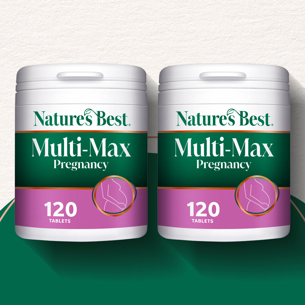 Two containers of Nature's Best Multi-Max Pregnancy tablets on a green and white background
