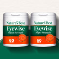 Two containers of Nature's Best Eyewise Super Strength tablets on a white background