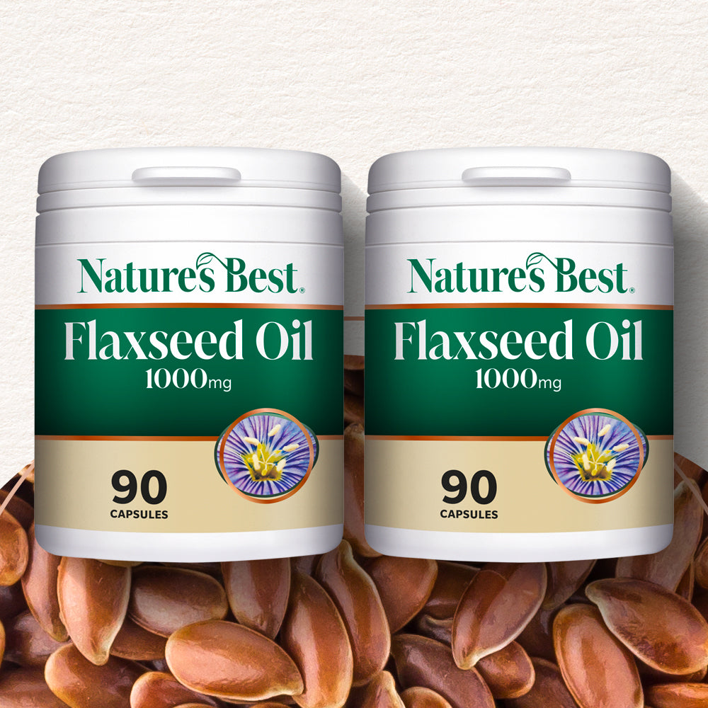 Two containers of Nature's Best Flaxseed Oil 1000mg with flaxseeds in the background.