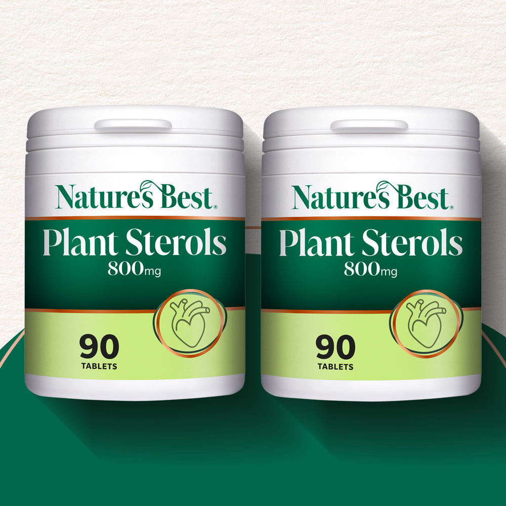 Two Plant Sterols product pots side by side on a green semicircle backgound at the bottom and a pale background at the top