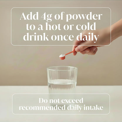 A hand holds a small orange measuring spoon containing white powder above a clear glass of water. Large text reads, 'Add 4g of powder to a hot or cold drink once daily' and 'Do not exceed recommended daily intake.