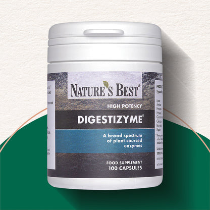 A white plastic bottle of Nature's Best Digestizyme high potency food supplement, 100 capsules, set against a split background of textured off-white and dark green.
