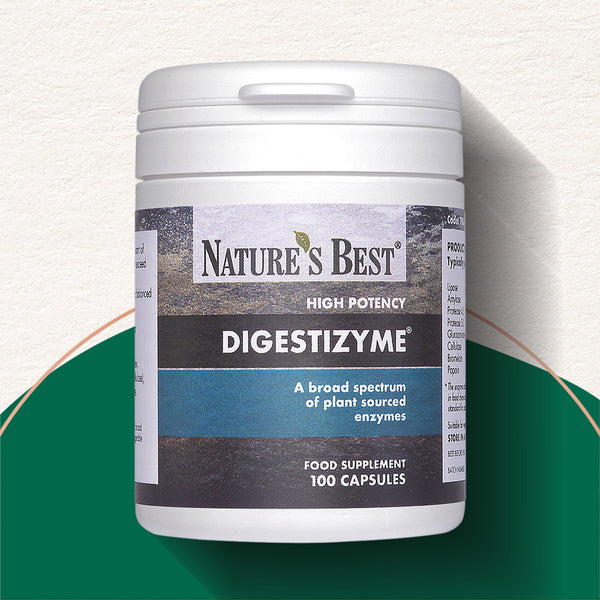 A white plastic bottle of Nature's Best Digestizyme high potency food supplement, 100 capsules, set against a split background of textured off-white and dark green.
