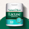 Nature's Best Lactase 9000 FCC supplement container on a green background