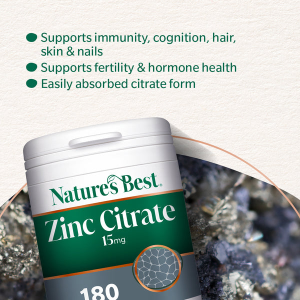 Nature's Best Zinc Citrate supplement container with text about its benefits on a blurred natural background.