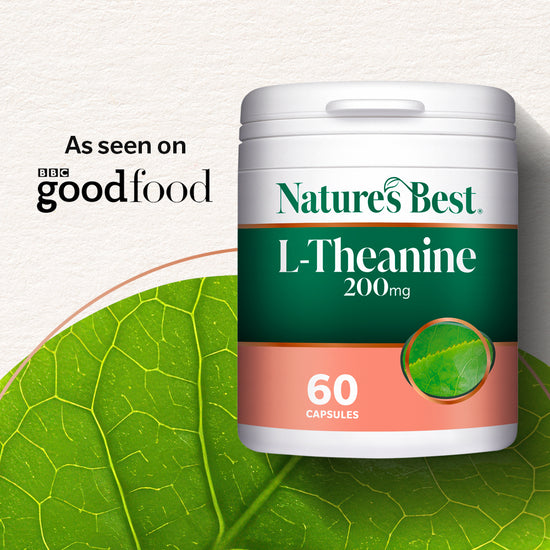Nature's Best L-Theanine 200mg supplement bottle with a white cap, featuring a green and peach label, set against a textured off-white background with a large green leaf graphic and 'As seen on BBC goodfood' text.