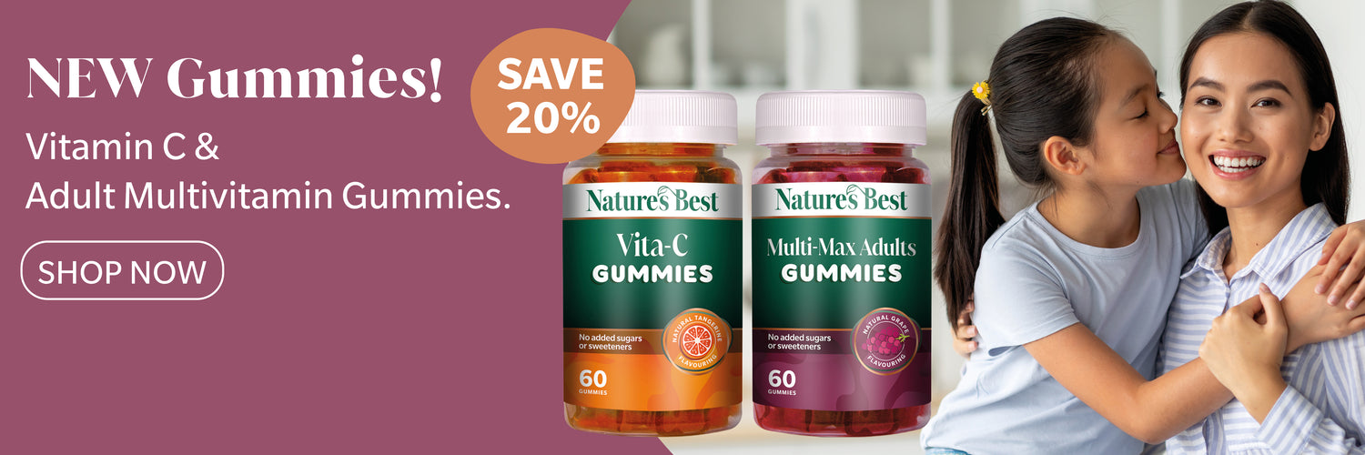 Promotional banner for Nature's Best Vitamin C and Adult Multivitamin Gummies, showing two bottles side by side with a smiling woman and child on the right, plus text reading 'NEW Gummies! SAVE 20%'.