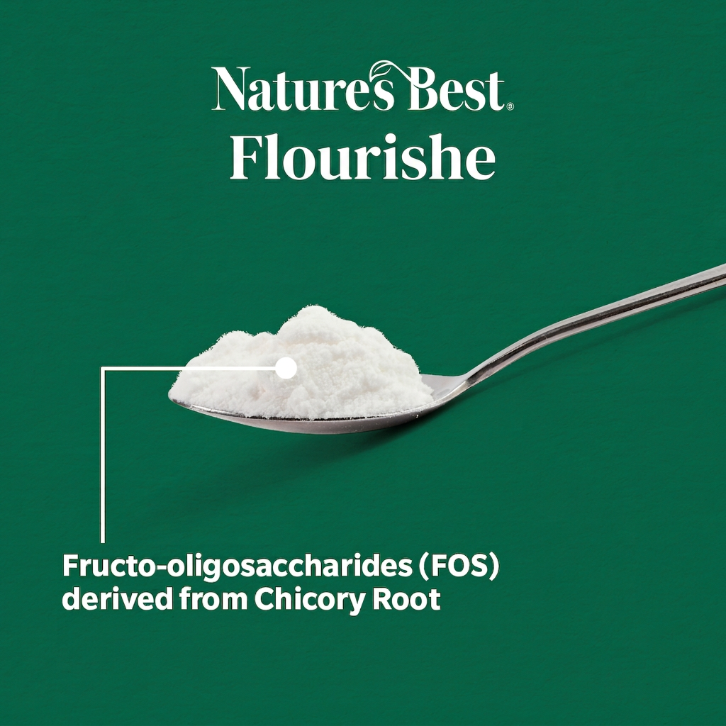 A spoonful of white flour or powder on a dark green background with the brand name 'Nature's Best Flourishe' at the top and text reading 'Fructo-oligosaccharides (FOS) derived from Chicory Root.'.