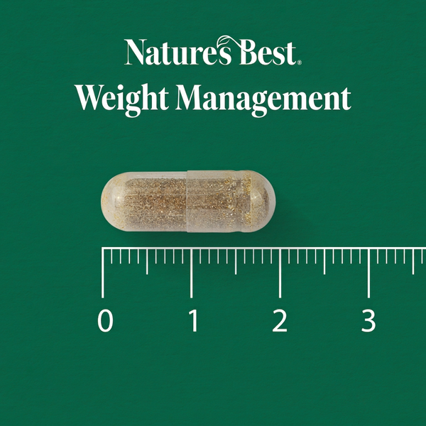 A clear capsule filled with brown powder sits on a dark green background with the text 'Nature's Best Weight Management' above it and a ruler below for scale.